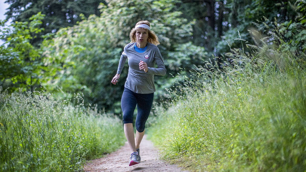 Joanna Harper runs through the wooded trails of Mt. Tabor Park in Portland, Oregon. Harper’s work at the intersection of science and gender studies is informing whether transgender individuals can equitably compete with other male and female athletes June 16, 2018 Beth Nakamura